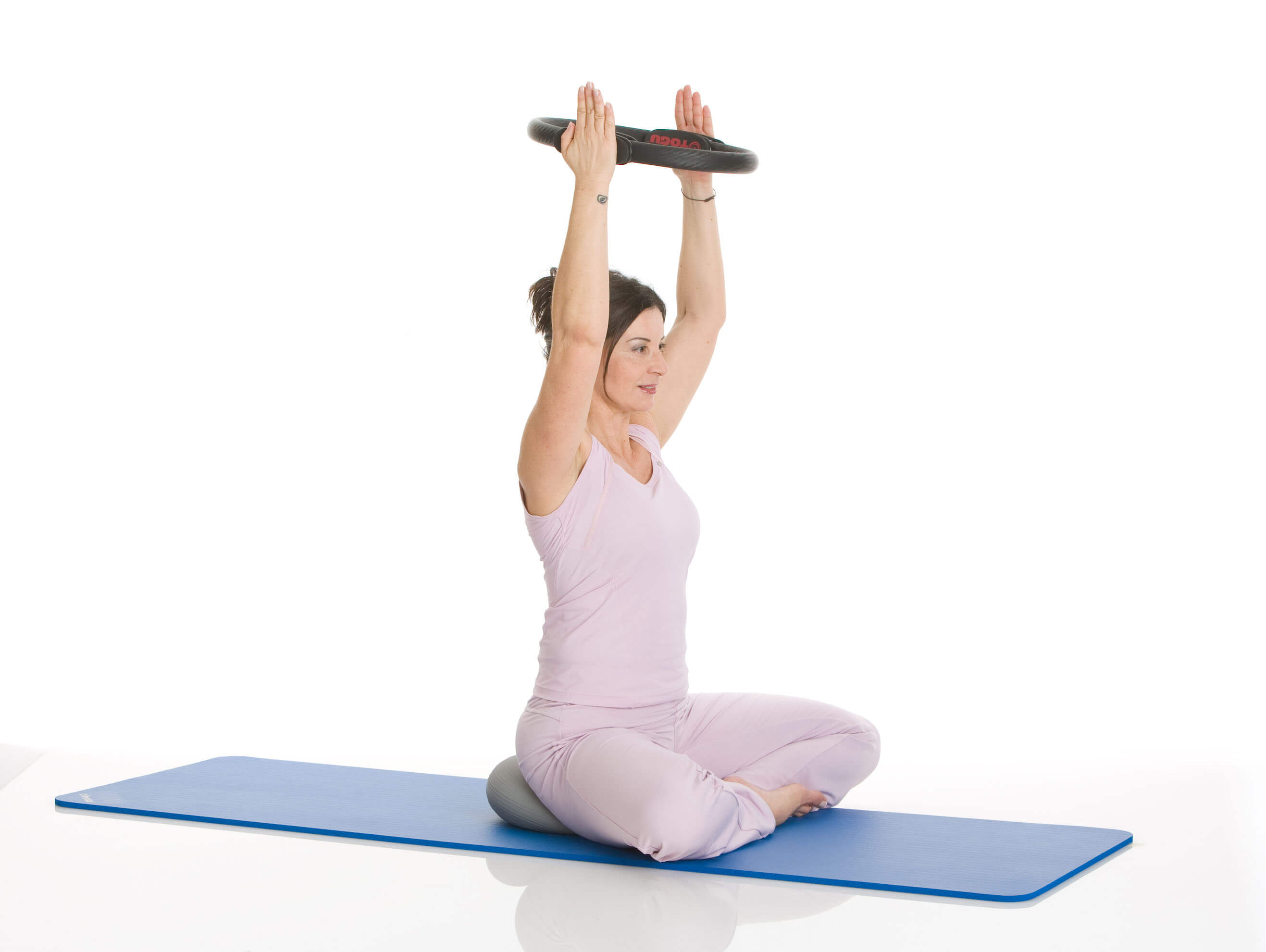 pilates-circle-premium_frau_sitzend-1-_tiny_web